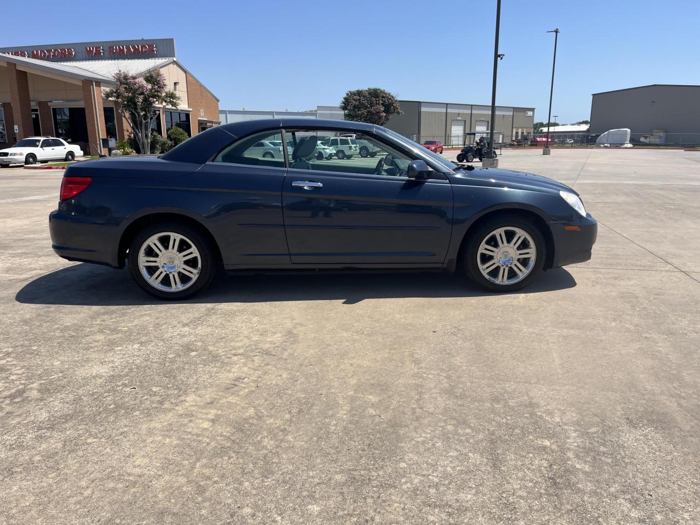 2008 blue /Gray Chrysler Sebring Convertible Limited (1C3LC65M28N) with an 3.5L V6 SOHC 24V engine, 6-Speed Automatic Overdrive transmission, located at 14700 Tomball Parkway 249, Houston, TX, 77086, (281) 444-2200, 29.928619, -95.504074 - Photo#7