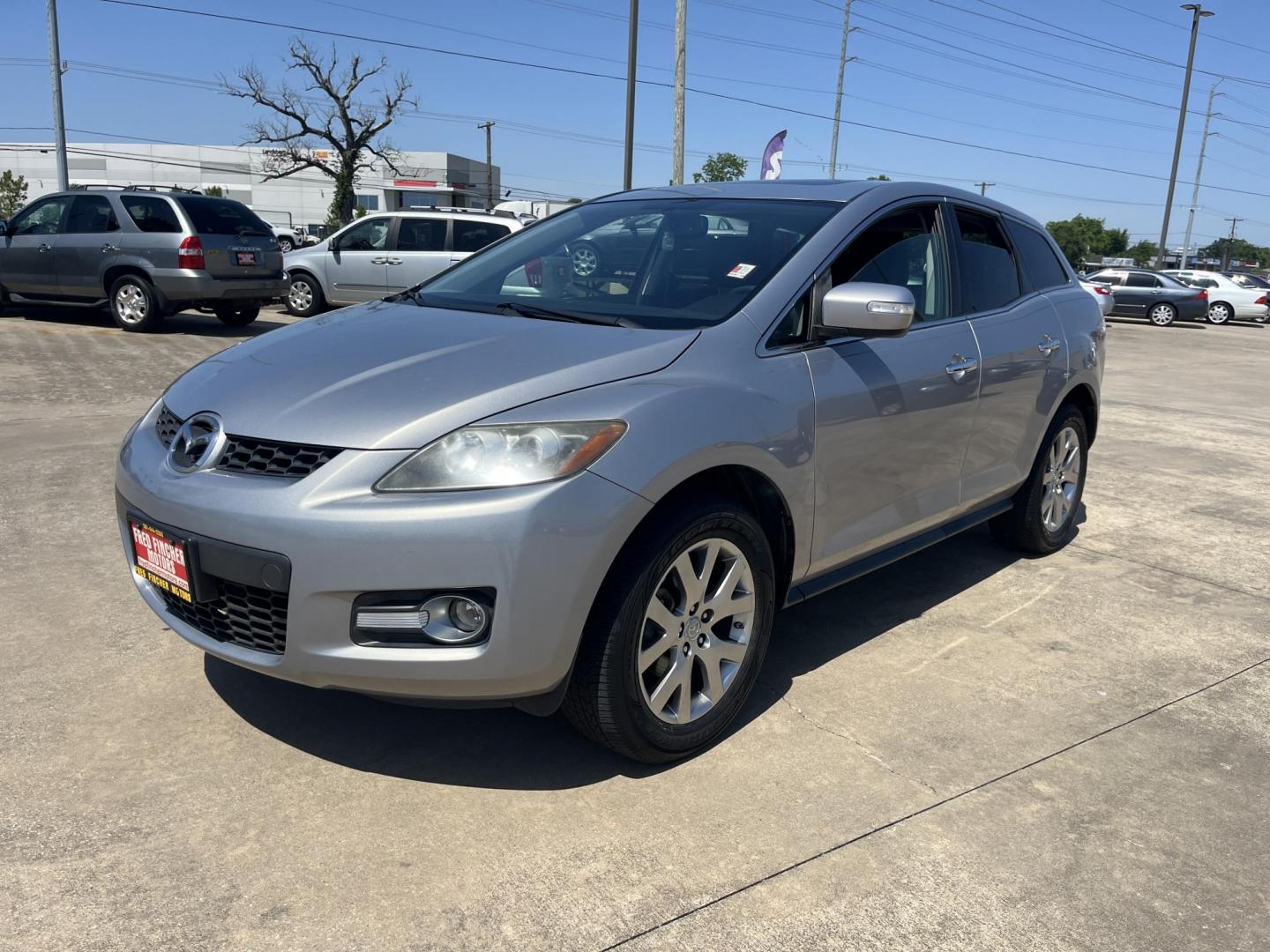 2009 Green /Black Mazda CX-7 Grand Touring AWD (JM3ER293890) with an 2.3L L4 DOHC 16V TURBO engine, 6-Speed Automatic transmission, located at 14700 Tomball Parkway 249, Houston, TX, 77086, (281) 444-2200, 29.928619, -95.504074 - Photo#2