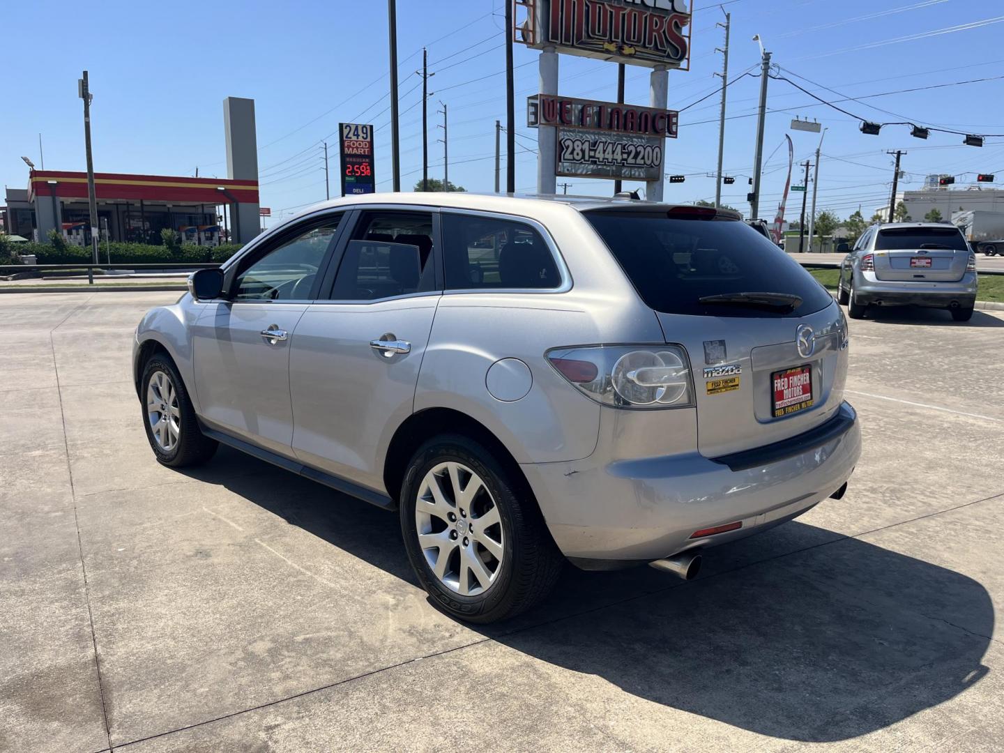 2009 Green /Black Mazda CX-7 Grand Touring AWD (JM3ER293890) with an 2.3L L4 DOHC 16V TURBO engine, 6-Speed Automatic transmission, located at 14700 Tomball Parkway 249, Houston, TX, 77086, (281) 444-2200, 29.928619, -95.504074 - Photo#4