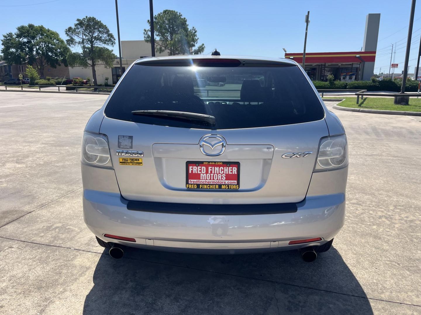 2009 Green /Black Mazda CX-7 Grand Touring AWD (JM3ER293890) with an 2.3L L4 DOHC 16V TURBO engine, 6-Speed Automatic transmission, located at 14700 Tomball Parkway 249, Houston, TX, 77086, (281) 444-2200, 29.928619, -95.504074 - Photo#5