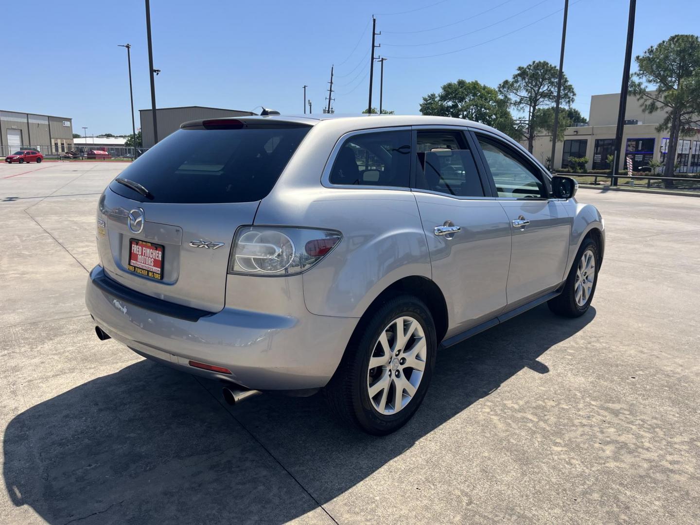 2009 Green /Black Mazda CX-7 Grand Touring AWD (JM3ER293890) with an 2.3L L4 DOHC 16V TURBO engine, 6-Speed Automatic transmission, located at 14700 Tomball Parkway 249, Houston, TX, 77086, (281) 444-2200, 29.928619, -95.504074 - Photo#6