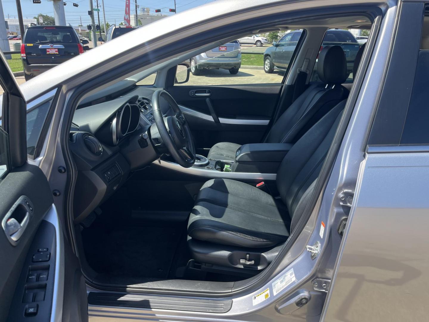 2009 Green /Black Mazda CX-7 Grand Touring AWD (JM3ER293890) with an 2.3L L4 DOHC 16V TURBO engine, 6-Speed Automatic transmission, located at 14700 Tomball Parkway 249, Houston, TX, 77086, (281) 444-2200, 29.928619, -95.504074 - Photo#8