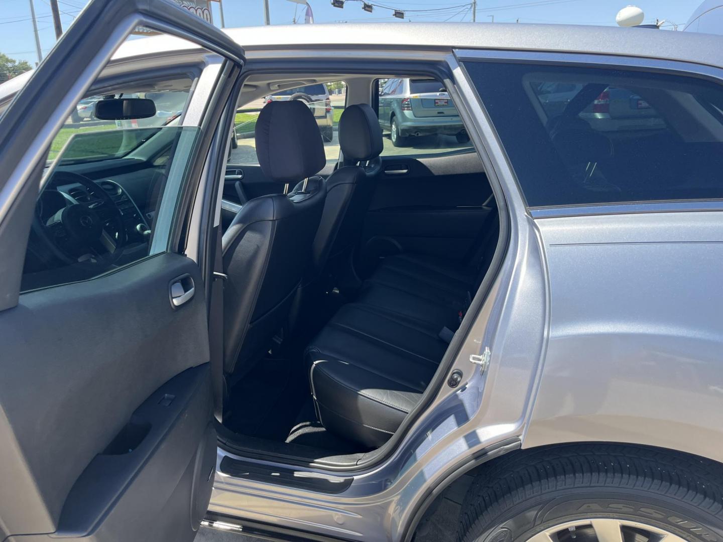 2009 Green /Black Mazda CX-7 Grand Touring AWD (JM3ER293890) with an 2.3L L4 DOHC 16V TURBO engine, 6-Speed Automatic transmission, located at 14700 Tomball Parkway 249, Houston, TX, 77086, (281) 444-2200, 29.928619, -95.504074 - Photo#9