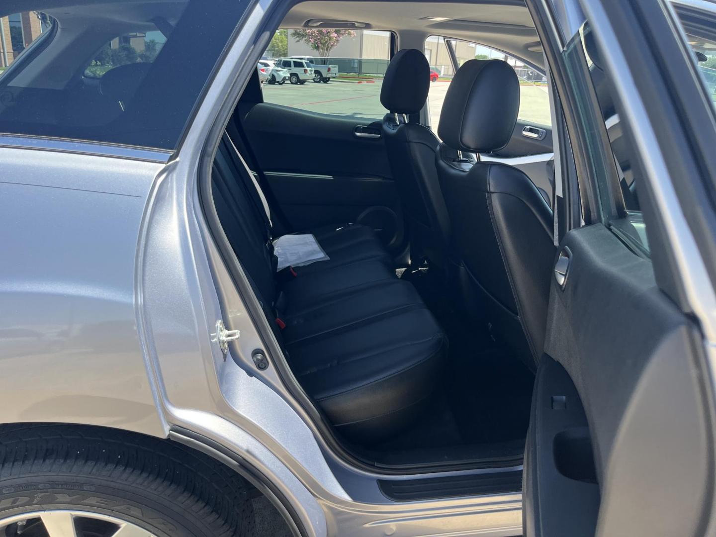 2009 Green /Black Mazda CX-7 Grand Touring AWD (JM3ER293890) with an 2.3L L4 DOHC 16V TURBO engine, 6-Speed Automatic transmission, located at 14700 Tomball Parkway 249, Houston, TX, 77086, (281) 444-2200, 29.928619, -95.504074 - Photo#12