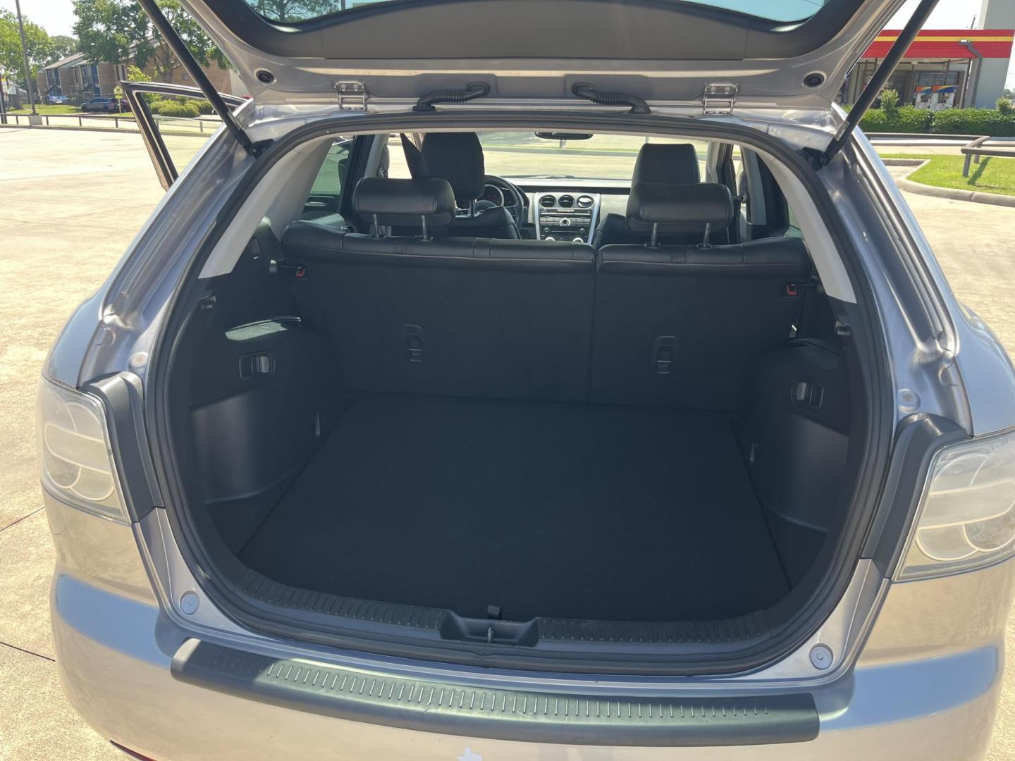 2009 Green /Black Mazda CX-7 Grand Touring AWD (JM3ER293890) with an 2.3L L4 DOHC 16V TURBO engine, 6-Speed Automatic transmission, located at 14700 Tomball Parkway 249, Houston, TX, 77086, (281) 444-2200, 29.928619, -95.504074 - Photo#13