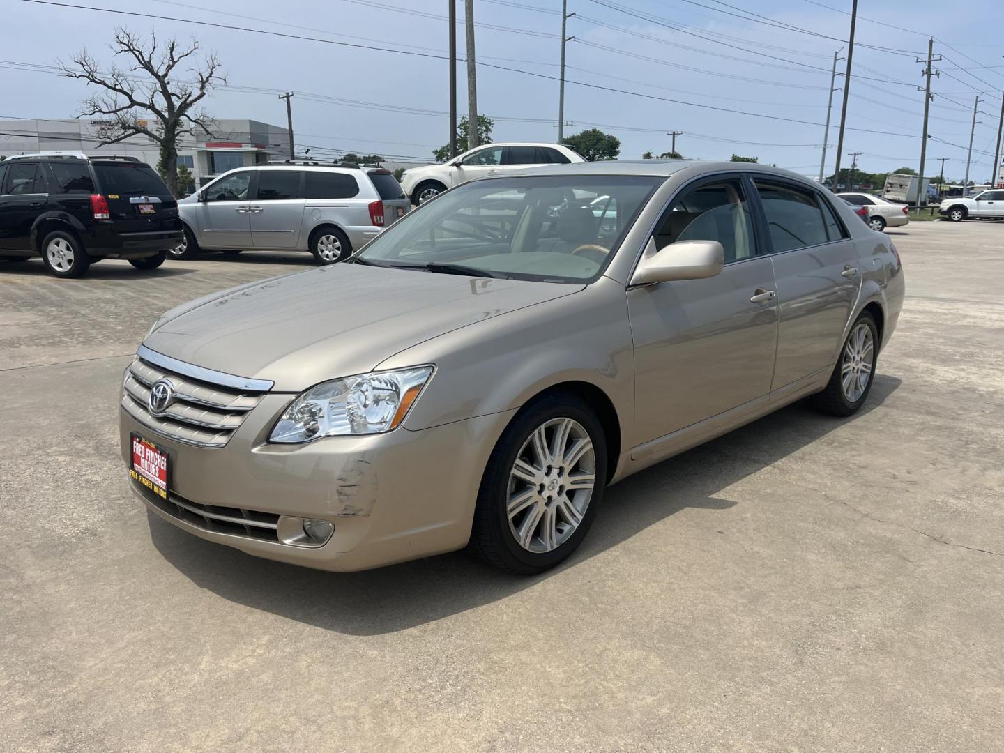 2006 GOLD /Tan Toyota Avalon Limited (4T1BK36B56U) with an 3.5L V6 DOHC 24V engine, 5-Speed Automatic Overdrive transmission, located at 14700 Tomball Parkway 249, Houston, TX, 77086, (281) 444-2200, 29.928619, -95.504074 - Photo#2