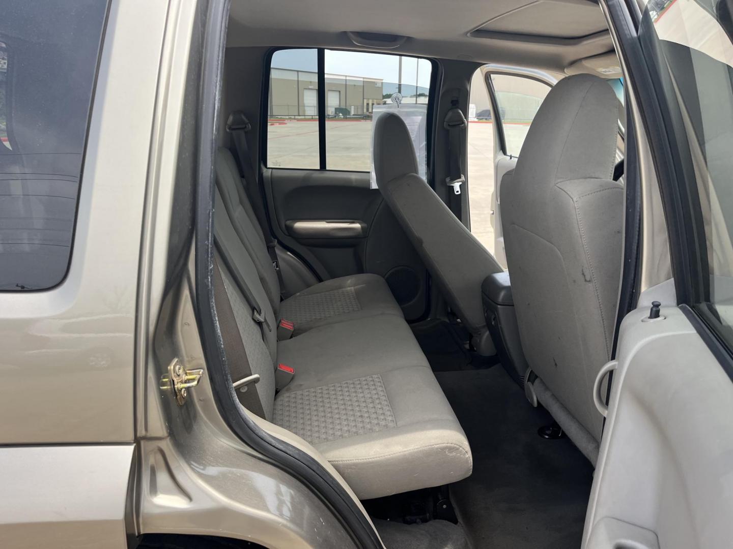 2006 GOLD /Tan Jeep Liberty Sport 4WD (1J8GL48K76W) with an 3.7L V6 SOHC 12V engine, Automatic transmission, located at 14700 Tomball Parkway 249, Houston, TX, 77086, (281) 444-2200, 29.928619, -95.504074 - Photo#12