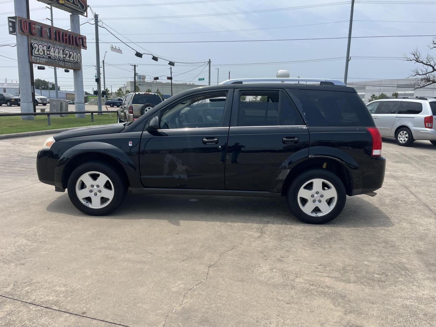 2007 black Saturn Vue FWD V6 (5GZCZ53457S) with an 3.5L V6 SOHC 24V engine, 5-Speed Automatic Overdrive transmission, located at 14700 Tomball Parkway 249, Houston, TX, 77086, (281) 444-2200, 29.928619, -95.504074 - Photo#3