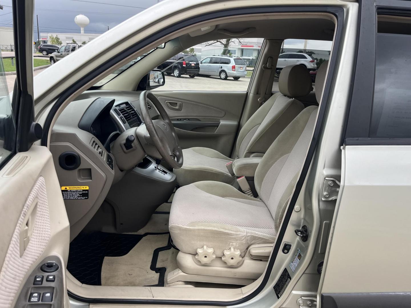 2006 Beige /Tan Hyundai Tucson GLS 2.7 2WD (KM8JN12D66U) with an 2.6L V6 DOHC 24V engine, 4-Speed Automatic Overdrive transmission, located at 14700 Tomball Parkway 249, Houston, TX, 77086, (281) 444-2200, 29.928619, -95.504074 - Photo#8