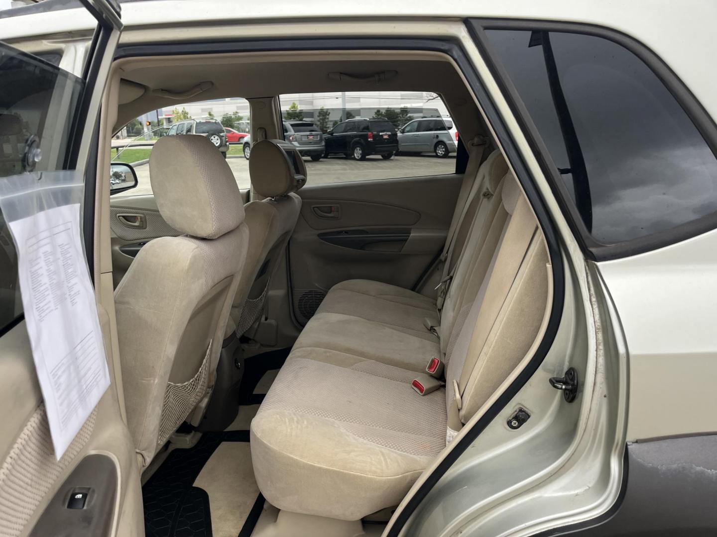 2006 Beige /Tan Hyundai Tucson GLS 2.7 2WD (KM8JN12D66U) with an 2.6L V6 DOHC 24V engine, 4-Speed Automatic Overdrive transmission, located at 14700 Tomball Parkway 249, Houston, TX, 77086, (281) 444-2200, 29.928619, -95.504074 - Photo#9