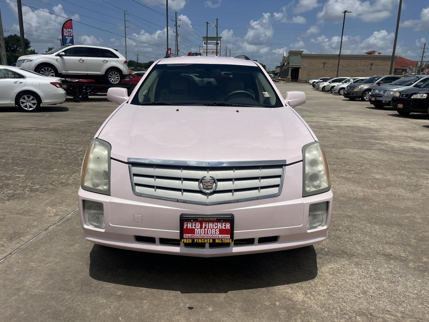 2008 Pink /Tan Cadillac SRX V6 AWD (1GYEE437280) with an 3.6L V6 OHV 24V engine, 5-Speed Automatic Overdrive transmission, located at 14700 Tomball Parkway 249, Houston, TX, 77086, (281) 444-2200, 29.928619, -95.504074 - Photo#1