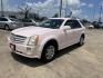 2008 Pink /Tan Cadillac SRX V6 AWD (1GYEE437280) with an 3.6L V6 OHV 24V engine, 5-Speed Automatic Overdrive transmission, located at 14700 Tomball Parkway 249, Houston, TX, 77086, (281) 444-2200, 29.928619, -95.504074 - Photo#2