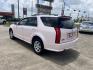 2008 Pink /Tan Cadillac SRX V6 AWD (1GYEE437280) with an 3.6L V6 OHV 24V engine, 5-Speed Automatic Overdrive transmission, located at 14700 Tomball Parkway 249, Houston, TX, 77086, (281) 444-2200, 29.928619, -95.504074 - Photo#4
