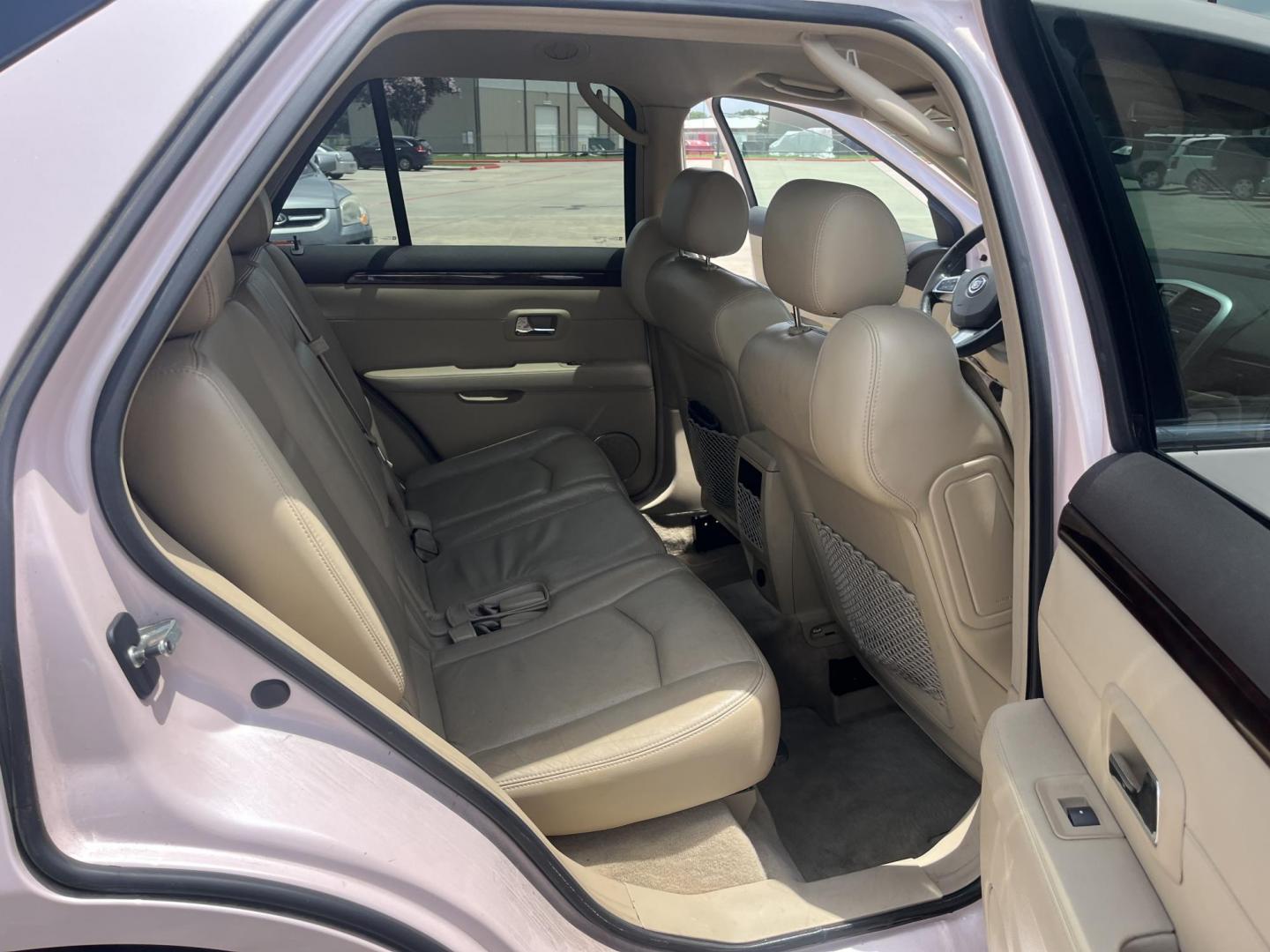 2008 Pink /Tan Cadillac SRX V6 AWD (1GYEE437280) with an 3.6L V6 OHV 24V engine, 5-Speed Automatic Overdrive transmission, located at 14700 Tomball Parkway 249, Houston, TX, 77086, (281) 444-2200, 29.928619, -95.504074 - Photo#13