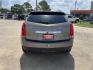 2012 Brown /Tan Cadillac SRX Performance (3GYFNBE39CS) with an 3.6L V6 DOHC 24V FFV engine, 6-Speed Automatic transmission, located at 14700 Tomball Parkway 249, Houston, TX, 77086, (281) 444-2200, 29.928619, -95.504074 - Photo#5