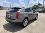 2012 Brown /Tan Cadillac SRX Performance (3GYFNBE39CS) with an 3.6L V6 DOHC 24V FFV engine, 6-Speed Automatic transmission, located at 14700 Tomball Parkway 249, Houston, TX, 77086, (281) 444-2200, 29.928619, -95.504074 - Photo#6