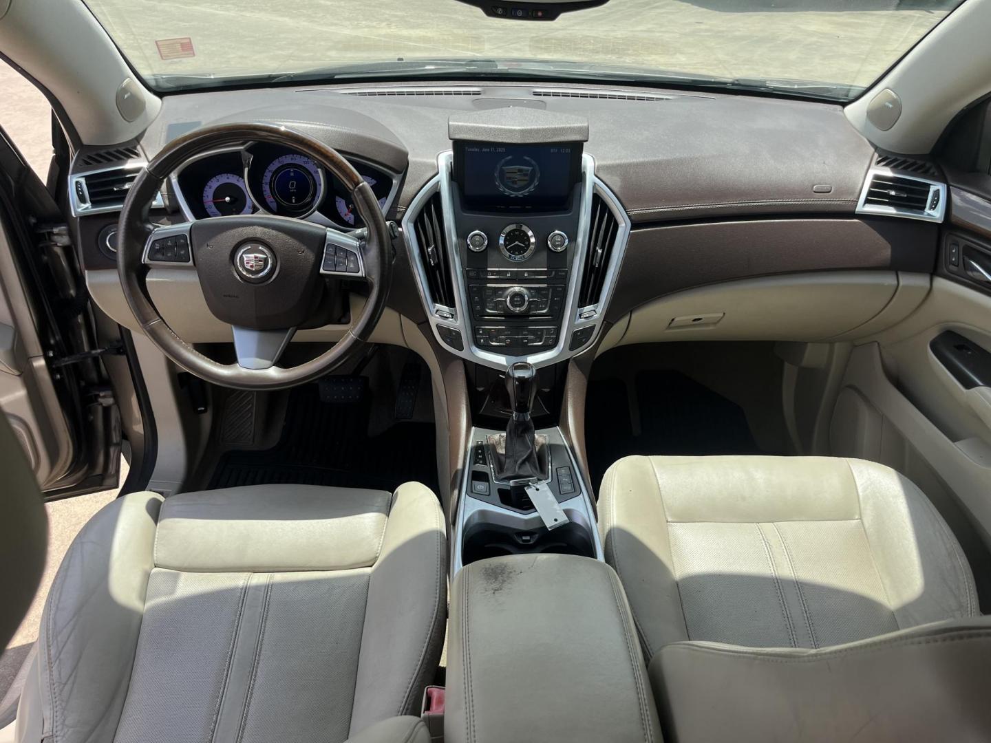 2012 Brown /Tan Cadillac SRX Performance (3GYFNBE39CS) with an 3.6L V6 DOHC 24V FFV engine, 6-Speed Automatic transmission, located at 14700 Tomball Parkway 249, Houston, TX, 77086, (281) 444-2200, 29.928619, -95.504074 - Photo#10