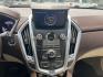 2012 Brown /Tan Cadillac SRX Performance (3GYFNBE39CS) with an 3.6L V6 DOHC 24V FFV engine, 6-Speed Automatic transmission, located at 14700 Tomball Parkway 249, Houston, TX, 77086, (281) 444-2200, 29.928619, -95.504074 - Photo#14