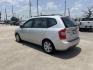 2007 silver /Gray Kia Rondo Base (KNAFG525077) with an 2.4L L4 DOHC 16V engine, 4-Speed Automatic Overdrive transmission, located at 14700 Tomball Parkway 249, Houston, TX, 77086, (281) 444-2200, 29.928619, -95.504074 - Photo#4