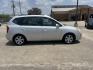 2007 silver /Gray Kia Rondo Base (KNAFG525077) with an 2.4L L4 DOHC 16V engine, 4-Speed Automatic Overdrive transmission, located at 14700 Tomball Parkway 249, Houston, TX, 77086, (281) 444-2200, 29.928619, -95.504074 - Photo#7