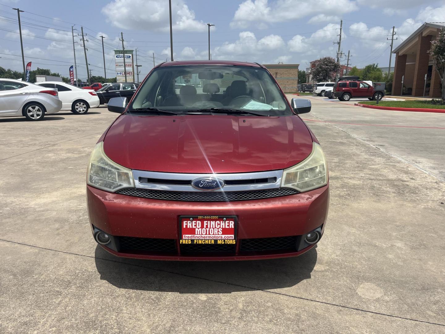 2010 red Ford Focus SEL Sedan (1FAHP3HN8AW) with an 2.0L L4 DOHC 16V engine, Auto transmission, located at 14700 Tomball Parkway 249, Houston, TX, 77086, (281) 444-2200, 29.928619, -95.504074 - Photo#1