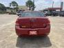 2010 red Ford Focus SEL Sedan (1FAHP3HN8AW) with an 2.0L L4 DOHC 16V engine, Auto transmission, located at 14700 Tomball Parkway 249, Houston, TX, 77086, (281) 444-2200, 29.928619, -95.504074 - Photo#5