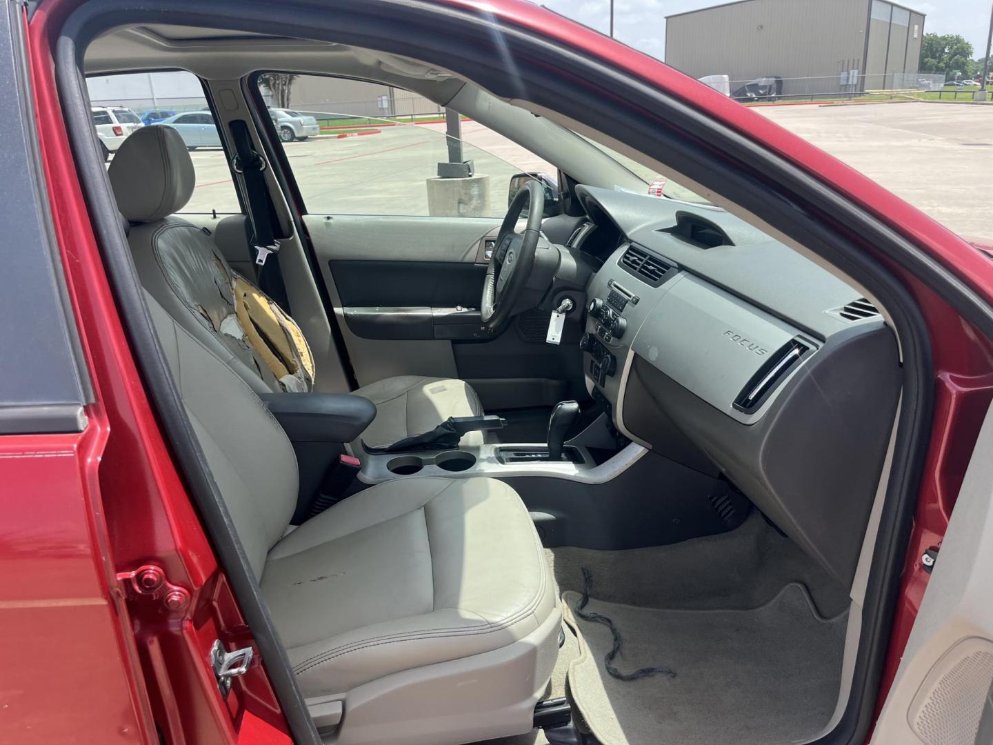 2010 red Ford Focus SEL Sedan (1FAHP3HN8AW) with an 2.0L L4 DOHC 16V engine, Auto transmission, located at 14700 Tomball Parkway 249, Houston, TX, 77086, (281) 444-2200, 29.928619, -95.504074 - Photo#11