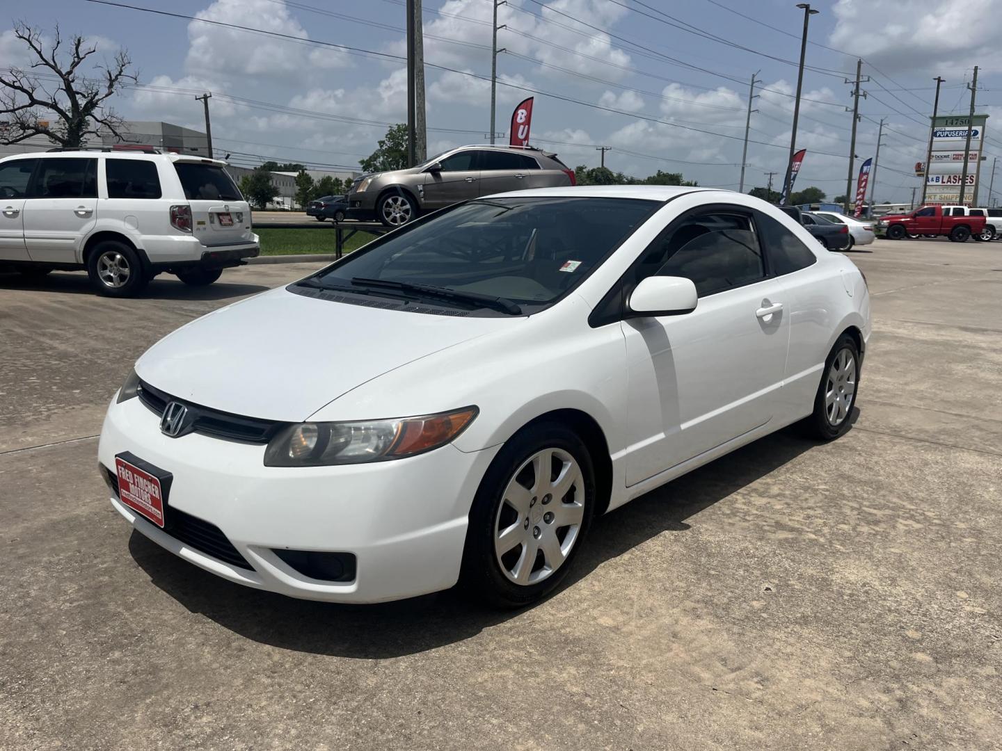 2008 white /Gray Honda Civic LX Coupe AT (2HGFG12658H) with an 1.8L L4 SOHC 16V engine, 5-Speed Automatic Overdrive transmission, located at 14700 Tomball Parkway 249, Houston, TX, 77086, (281) 444-2200, 29.928619, -95.504074 - Photo#2