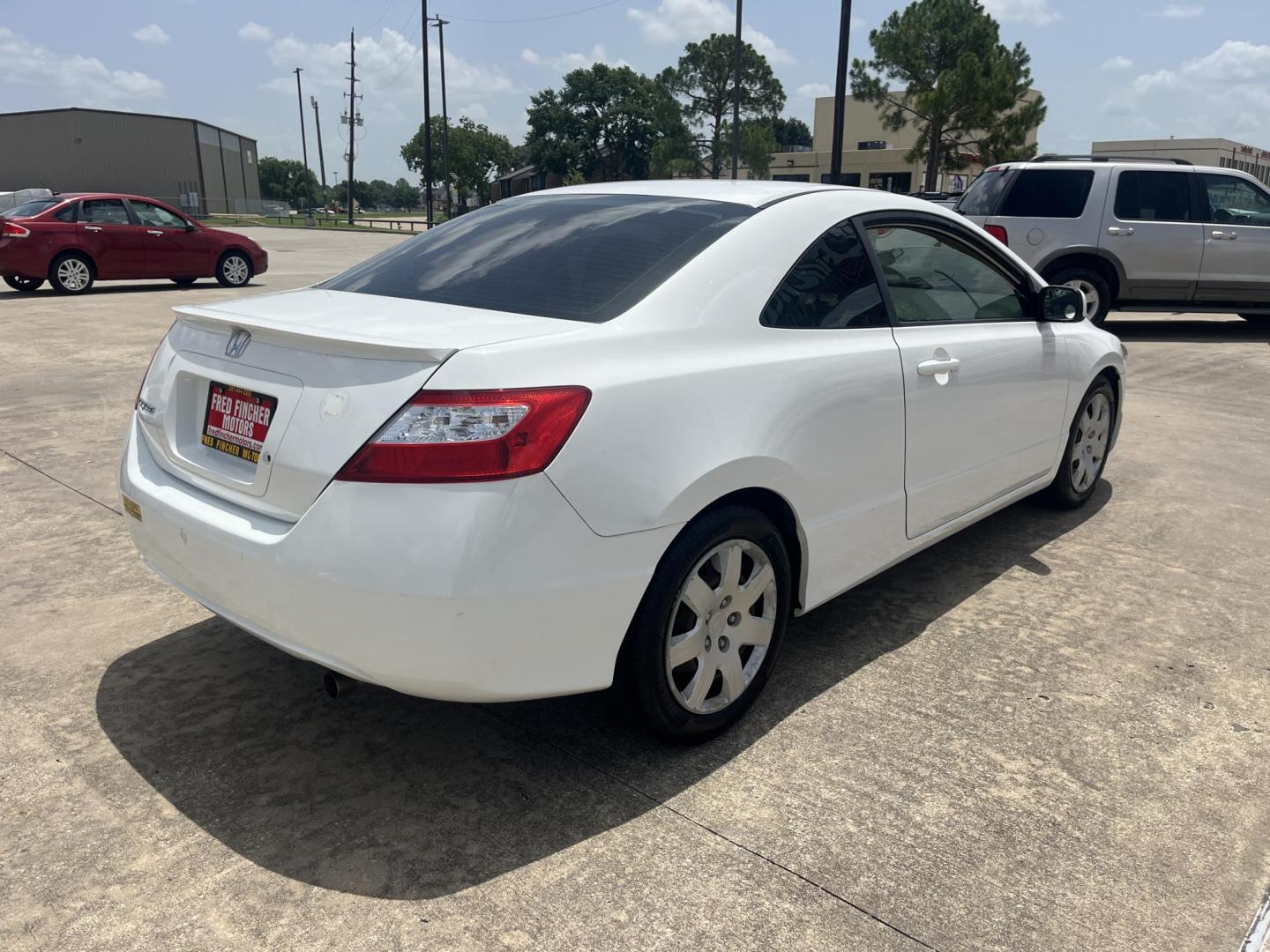 2008 white /Gray Honda Civic LX Coupe AT (2HGFG12658H) with an 1.8L L4 SOHC 16V engine, 5-Speed Automatic Overdrive transmission, located at 14700 Tomball Parkway 249, Houston, TX, 77086, (281) 444-2200, 29.928619, -95.504074 - Photo#6