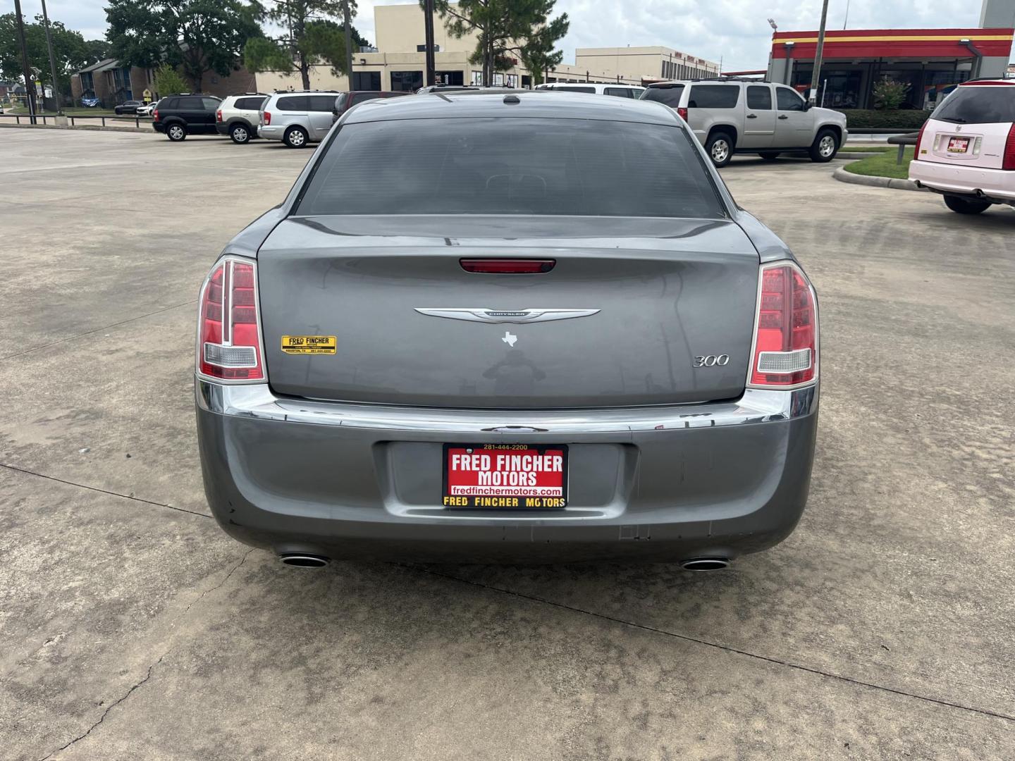 2012 GRAY /Tan Chrysler 300 Base (2C3CCAAG6CH) with an 3.6L V6 SOHC 24V engine, 5-Speed Automatic transmission, located at 14700 Tomball Parkway 249, Houston, TX, 77086, (281) 444-2200, 29.928619, -95.504074 - Photo#5
