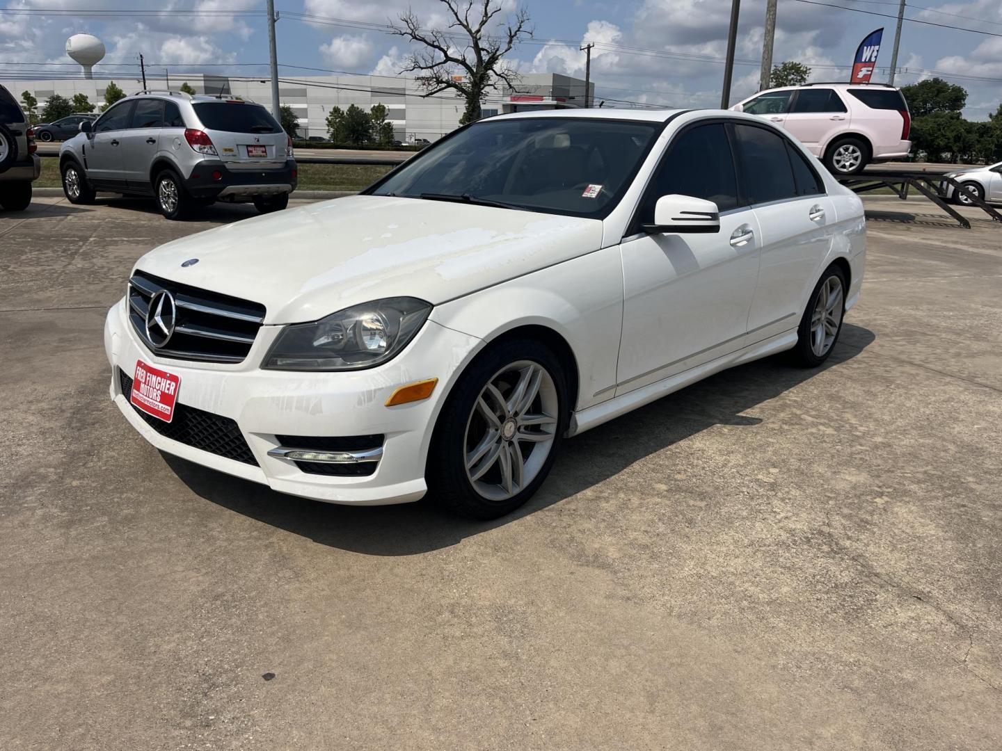 2014 white /Tan Mercedes-Benz C-Class C250 Luxury Sedan (WDDGF4HB0EA) with an 3.0L V6 DOHC 16V engine, 7-Speed Automatic transmission, located at 14700 Tomball Parkway 249, Houston, TX, 77086, (281) 444-2200, 29.928619, -95.504074 - Photo#2