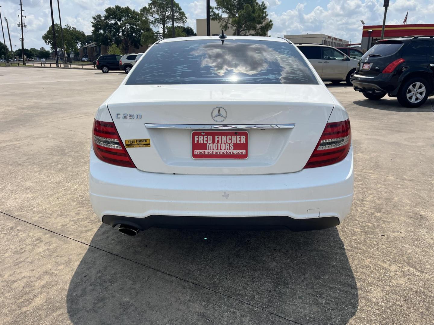 2014 white /Tan Mercedes-Benz C-Class C250 Luxury Sedan (WDDGF4HB0EA) with an 3.0L V6 DOHC 16V engine, 7-Speed Automatic transmission, located at 14700 Tomball Parkway 249, Houston, TX, 77086, (281) 444-2200, 29.928619, -95.504074 - Photo#5