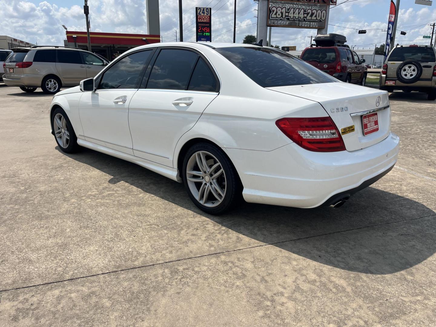 2014 white /Tan Mercedes-Benz C-Class C250 Luxury Sedan (WDDGF4HB0EA) with an 3.0L V6 DOHC 16V engine, 7-Speed Automatic transmission, located at 14700 Tomball Parkway 249, Houston, TX, 77086, (281) 444-2200, 29.928619, -95.504074 - Photo#4