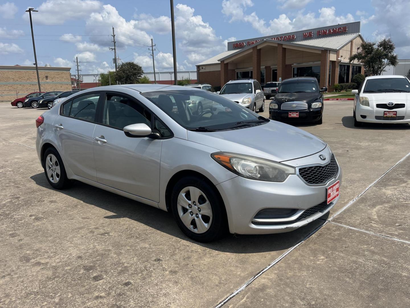 2015 silver /Black Kia Forte LX (KNAFK4A6XF5) with an 1.8L L4 DOHC 16V engine, Auto transmission, located at 14700 Tomball Parkway 249, Houston, TX, 77086, (281) 444-2200, 29.928619, -95.504074 - Photo#0
