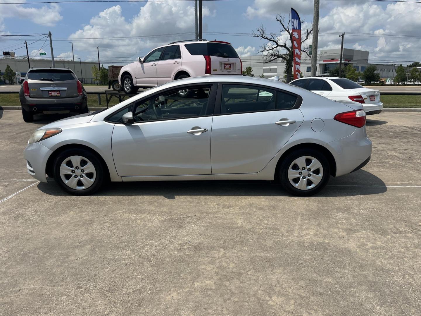 2015 silver /Black Kia Forte LX (KNAFK4A6XF5) with an 1.8L L4 DOHC 16V engine, Auto transmission, located at 14700 Tomball Parkway 249, Houston, TX, 77086, (281) 444-2200, 29.928619, -95.504074 - Photo#3