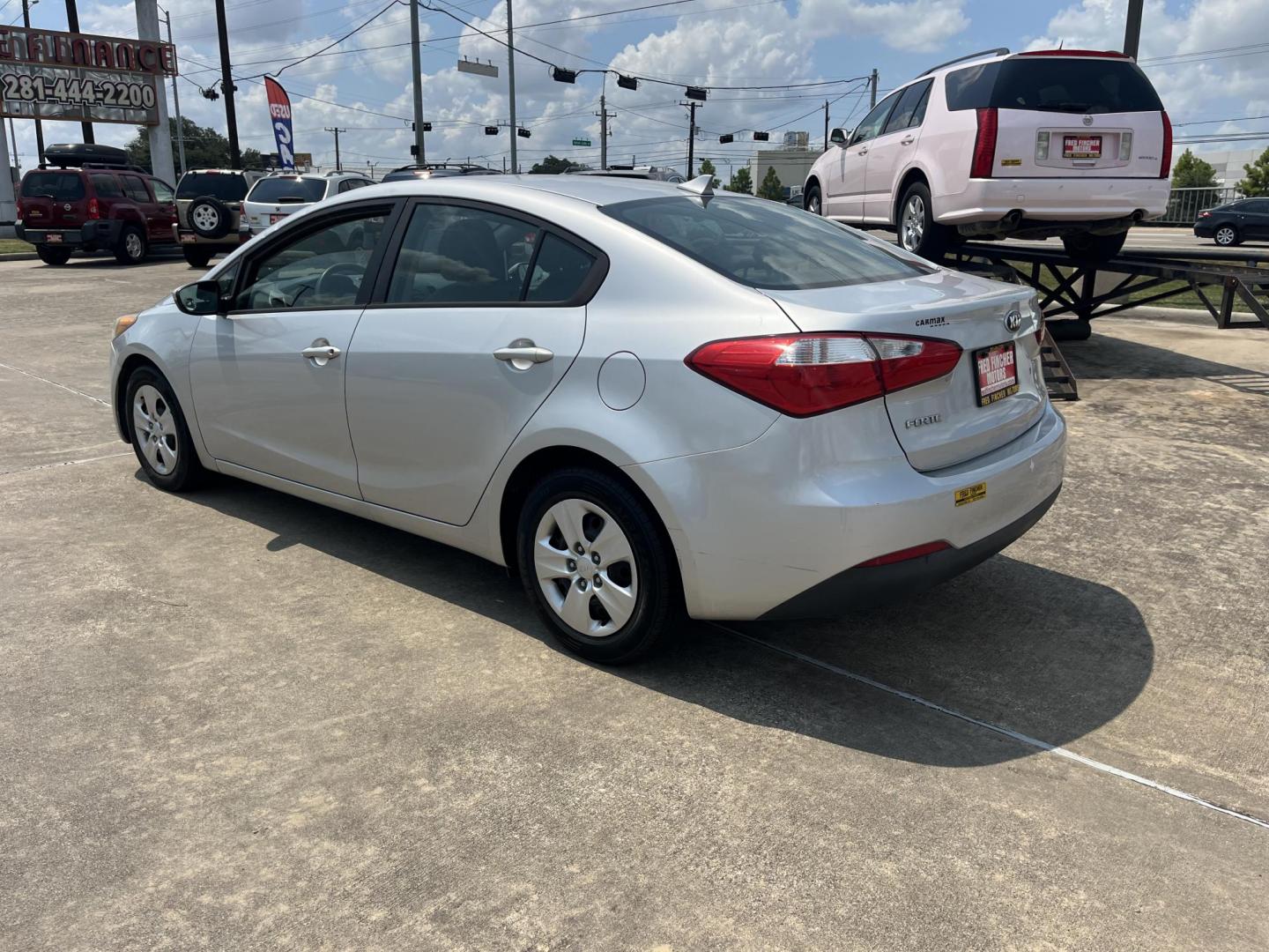 2015 silver /Black Kia Forte LX (KNAFK4A6XF5) with an 1.8L L4 DOHC 16V engine, Auto transmission, located at 14700 Tomball Parkway 249, Houston, TX, 77086, (281) 444-2200, 29.928619, -95.504074 - Photo#4