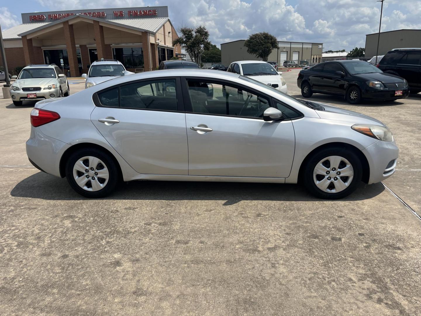 2015 silver /Black Kia Forte LX (KNAFK4A6XF5) with an 1.8L L4 DOHC 16V engine, Auto transmission, located at 14700 Tomball Parkway 249, Houston, TX, 77086, (281) 444-2200, 29.928619, -95.504074 - Photo#6