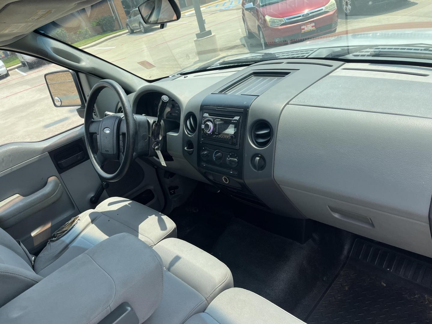 2006 silver Ford F-150 STX 2WD (1FTRF12256N) with an 4.2L V6 OHV 12V engine, located at 14700 Tomball Parkway 249, Houston, TX, 77086, (281) 444-2200, 29.928619, -95.504074 - Photo#11