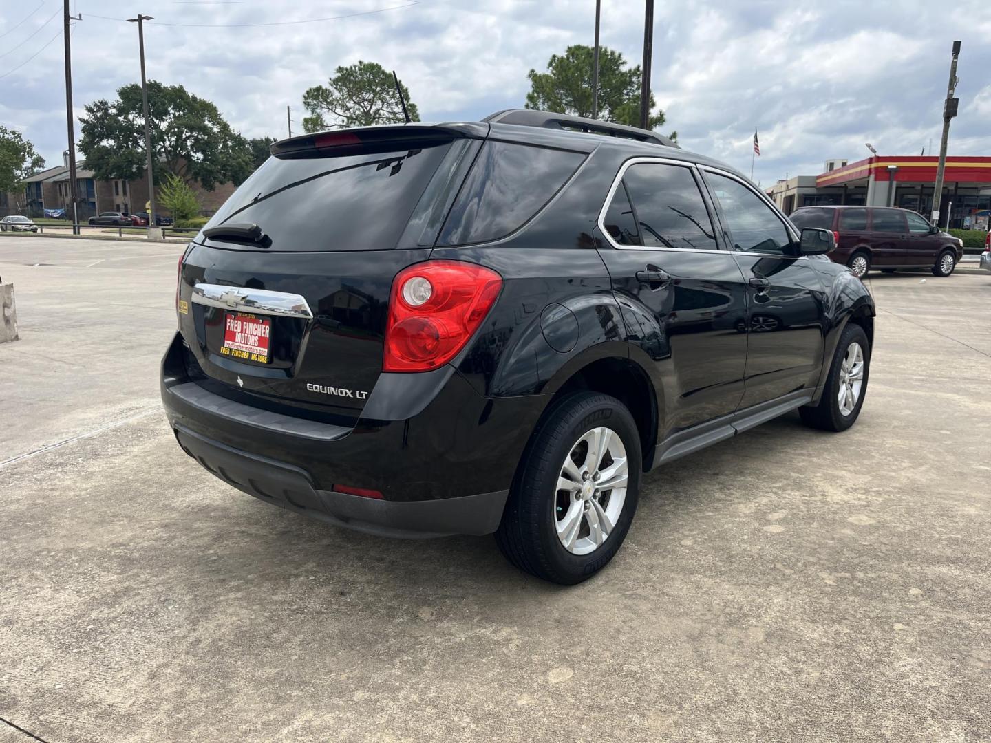 2013 Black /Black Chevrolet Equinox 2LT 2WD (2GNALPEKXD6) with an 2.4L L4 DOHC 16V engine, 6-Speed Automatic transmission, located at 14700 Tomball Parkway 249, Houston, TX, 77086, (281) 444-2200, 29.928619, -95.504074 - Photo#6