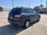 2011 blue Hyundai Santa Fe GL 2.4 FWD (5XYZG3ABXBG) with an 2.4L L4 DOHC 16V engine, 6-Speed Automatic transmission, located at 14700 Tomball Parkway 249, Houston, TX, 77086, (281) 444-2200, 29.928619, -95.504074 - Photo#6