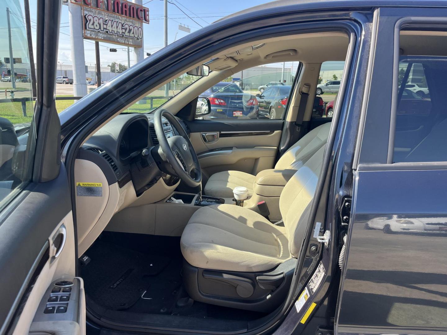 2011 blue Hyundai Santa Fe GL 2.4 FWD (5XYZG3ABXBG) with an 2.4L L4 DOHC 16V engine, 6-Speed Automatic transmission, located at 14700 Tomball Parkway 249, Houston, TX, 77086, (281) 444-2200, 29.928619, -95.504074 - Photo#8