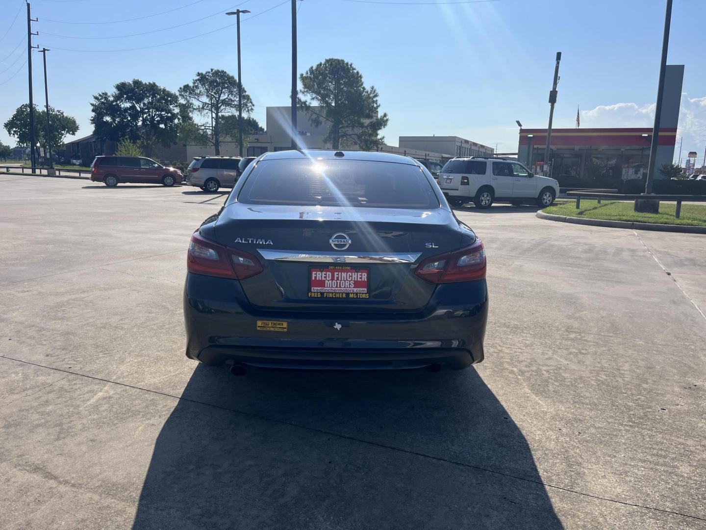 2018 blue /Black Nissan Altima 2.5 (1N4AL3AP7JC) with an 2.5L L4 DOHC 16V engine, CVT transmission, located at 14700 Tomball Parkway 249, Houston, TX, 77086, (281) 444-2200, 29.928619, -95.504074 - Photo#5