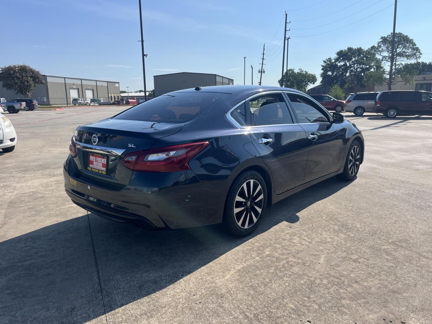 2018 blue /Black Nissan Altima 2.5 (1N4AL3AP7JC) with an 2.5L L4 DOHC 16V engine, CVT transmission, located at 14700 Tomball Parkway 249, Houston, TX, 77086, (281) 444-2200, 29.928619, -95.504074 - Photo#6