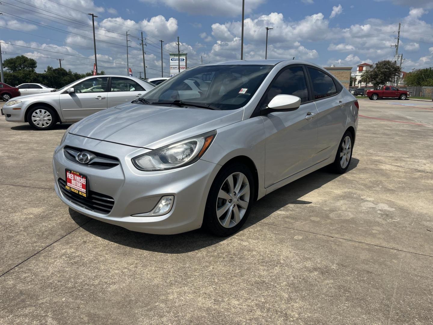 2012 silver Hyundai Accent GLS 4-Door (KMHCU4AE9CU) with an 1.6L L4 DOHC 16V engine, Automatic transmission, located at 14700 Tomball Parkway 249, Houston, TX, 77086, (281) 444-2200, 29.928619, -95.504074 - Photo#2