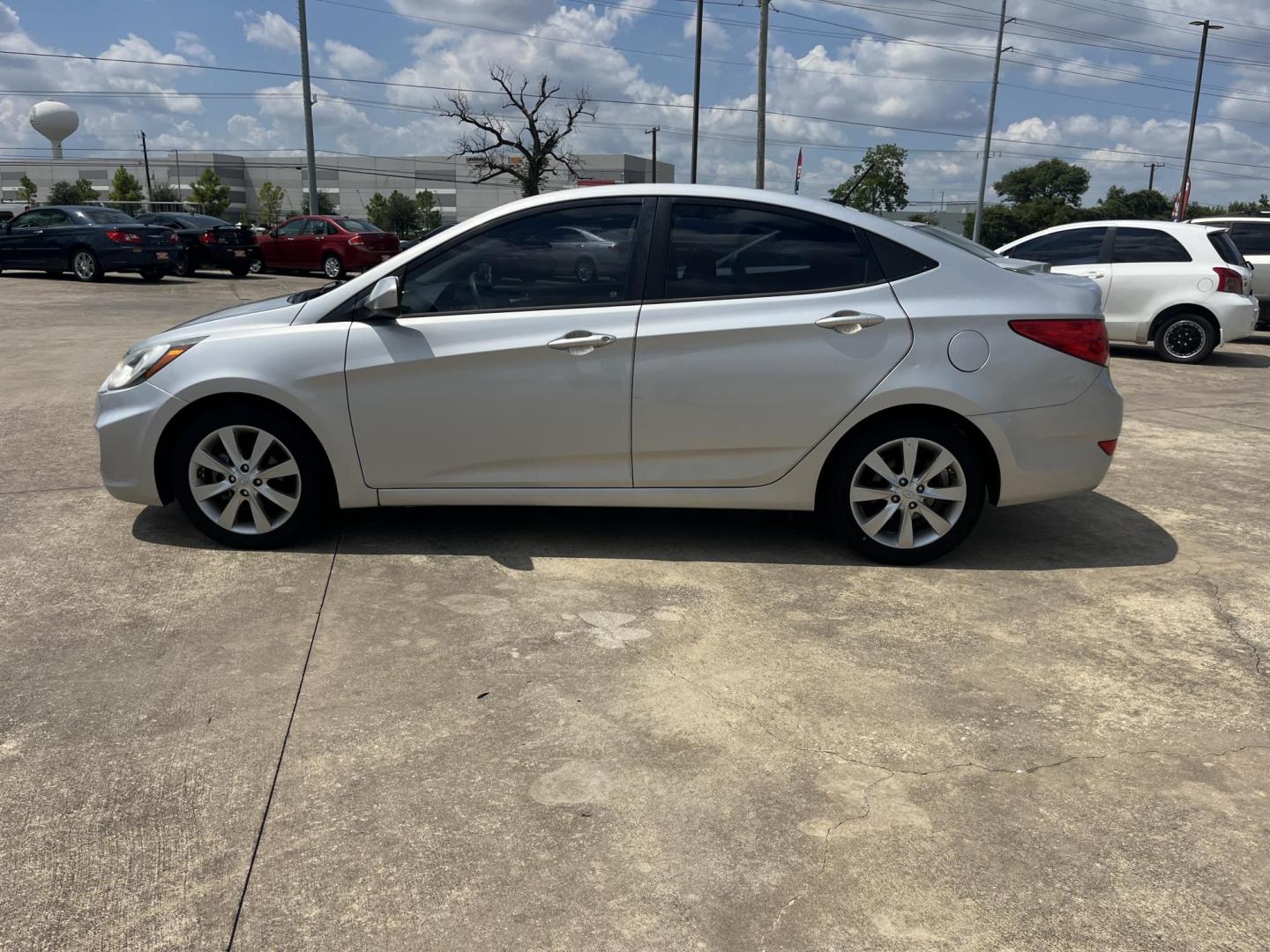 2012 silver Hyundai Accent GLS 4-Door (KMHCU4AE9CU) with an 1.6L L4 DOHC 16V engine, Automatic transmission, located at 14700 Tomball Parkway 249, Houston, TX, 77086, (281) 444-2200, 29.928619, -95.504074 - Photo#3