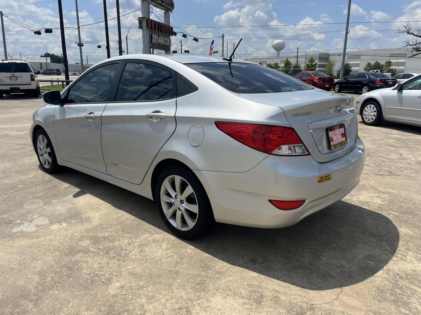 2012 silver Hyundai Accent GLS 4-Door (KMHCU4AE9CU) with an 1.6L L4 DOHC 16V engine, Automatic transmission, located at 14700 Tomball Parkway 249, Houston, TX, 77086, (281) 444-2200, 29.928619, -95.504074 - Photo#4