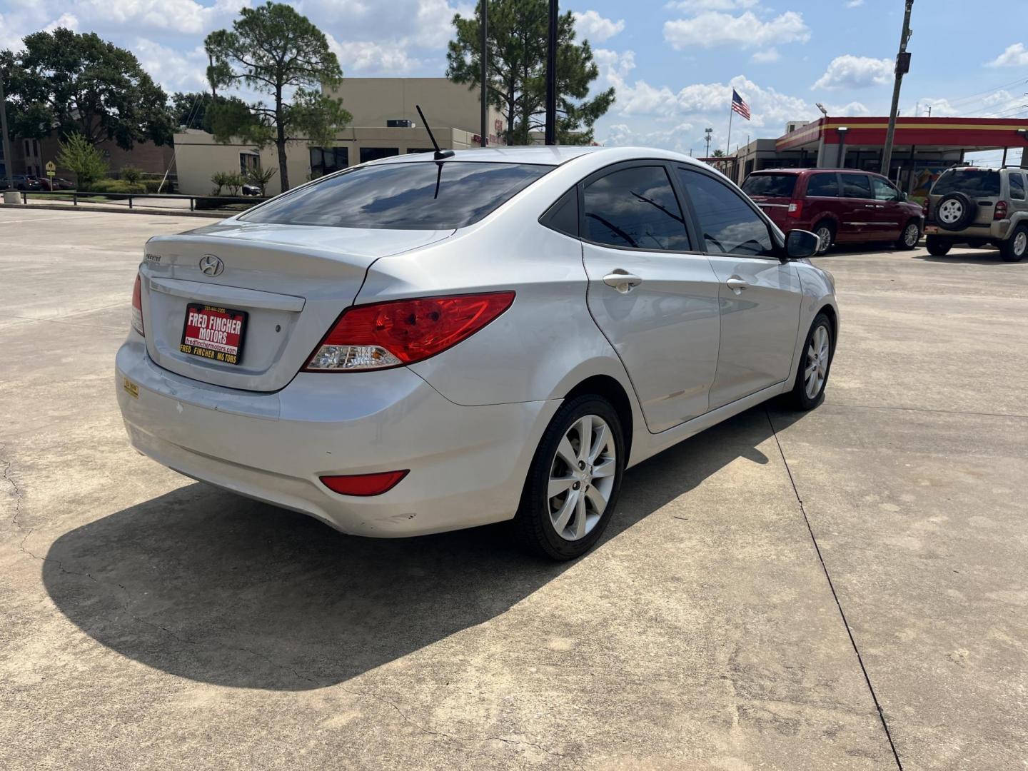2012 silver Hyundai Accent GLS 4-Door (KMHCU4AE9CU) with an 1.6L L4 DOHC 16V engine, Automatic transmission, located at 14700 Tomball Parkway 249, Houston, TX, 77086, (281) 444-2200, 29.928619, -95.504074 - Photo#6