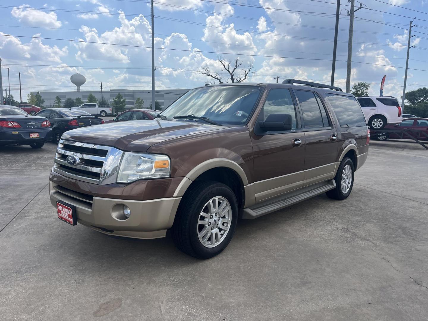 2011 Brown Ford Expedition EL King Ranch 2WD (1FMJK1H5XBE) with an 5.4L V8 SOHC 16V FFV engine, 6-Speed Automatic transmission, located at 14700 Tomball Parkway 249, Houston, TX, 77086, (281) 444-2200, 29.928619, -95.504074 - Photo#2