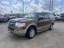 2011 Brown Ford Expedition EL King Ranch 2WD (1FMJK1H5XBE) with an 5.4L V8 SOHC 16V FFV engine, 6-Speed Automatic transmission, located at 14700 Tomball Parkway 249, Houston, TX, 77086, (281) 444-2200, 29.928619, -95.504074 - Photo#2