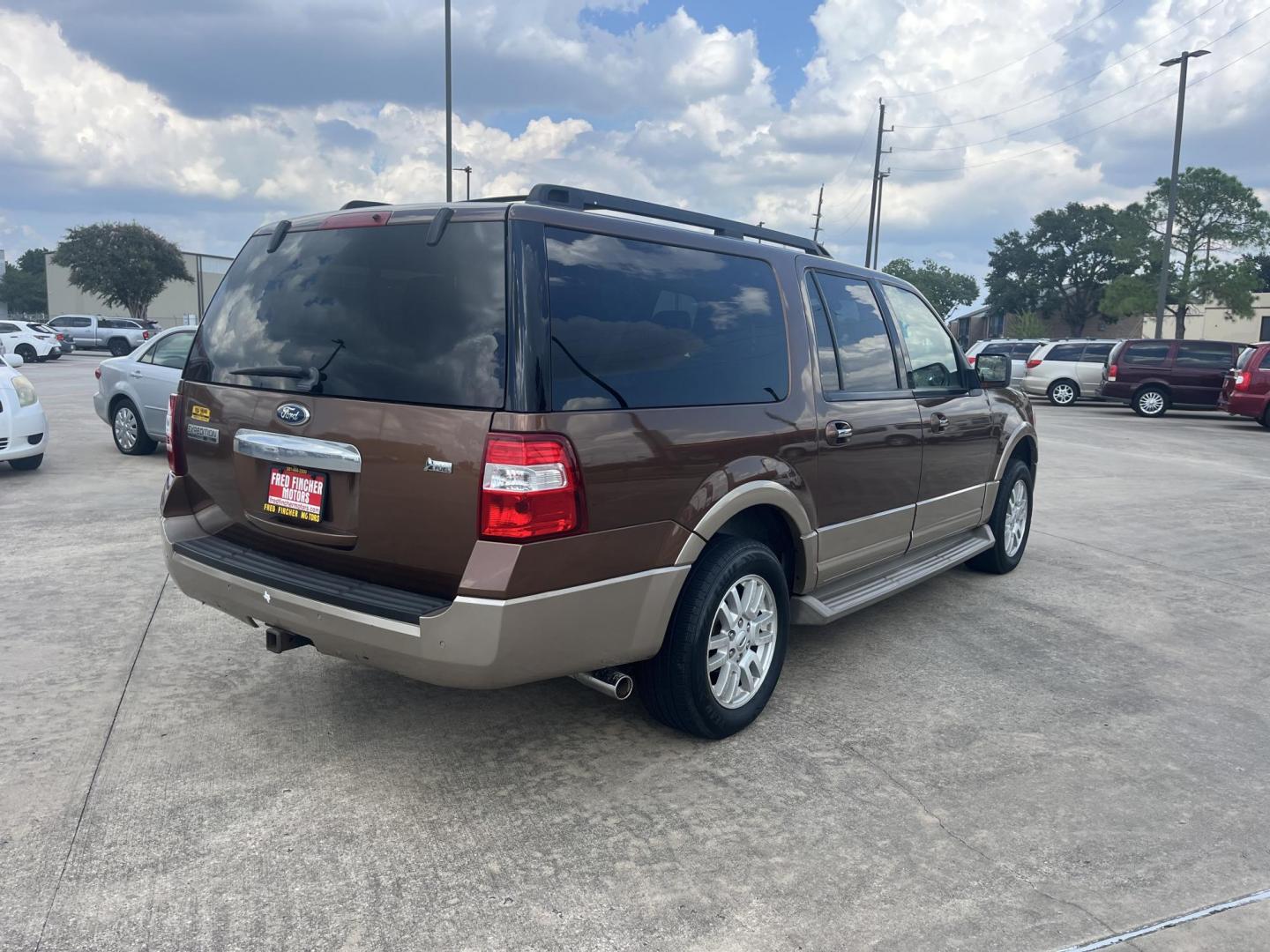 2011 Brown Ford Expedition EL King Ranch 2WD (1FMJK1H5XBE) with an 5.4L V8 SOHC 16V FFV engine, 6-Speed Automatic transmission, located at 14700 Tomball Parkway 249, Houston, TX, 77086, (281) 444-2200, 29.928619, -95.504074 - Photo#6